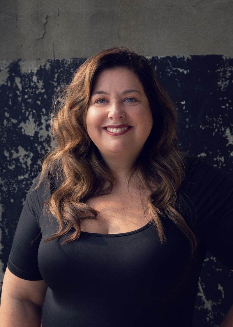 Kelly Wondra, founder and lead nail tech, at her station