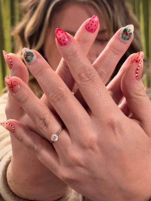 Almond nails with hand-painted holiday wreaths, candy stripes and berries